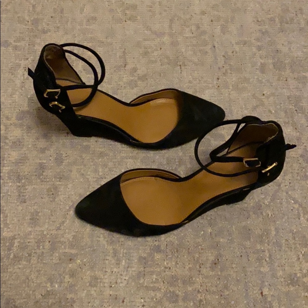 Black suede pumps with ankle strap